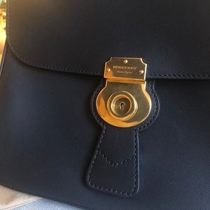 Brand new never used- Burberry handbag. Tags still on. Receipt available.